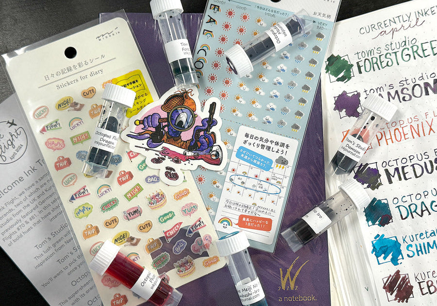 InkJournal.com Ink Flight Subscription box April contents with Wonderland 222 Tomoe River Paper notebooks