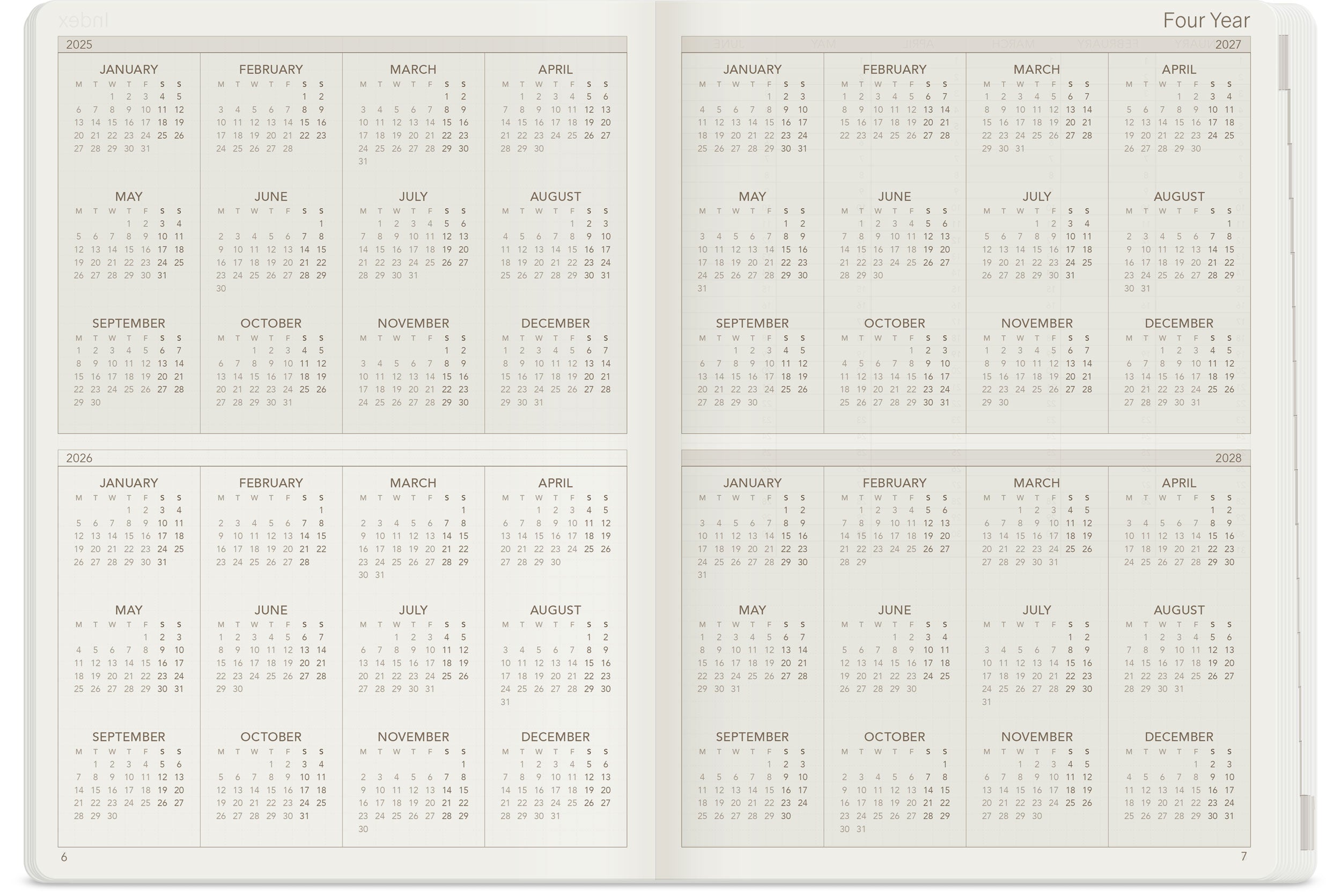 Wonderland 222 2026 A5 Core planner interior featuring four-year calendar overview (2025, 2026, 2027, 2028) with clean grid layout on ultra lightweight warm white paper.