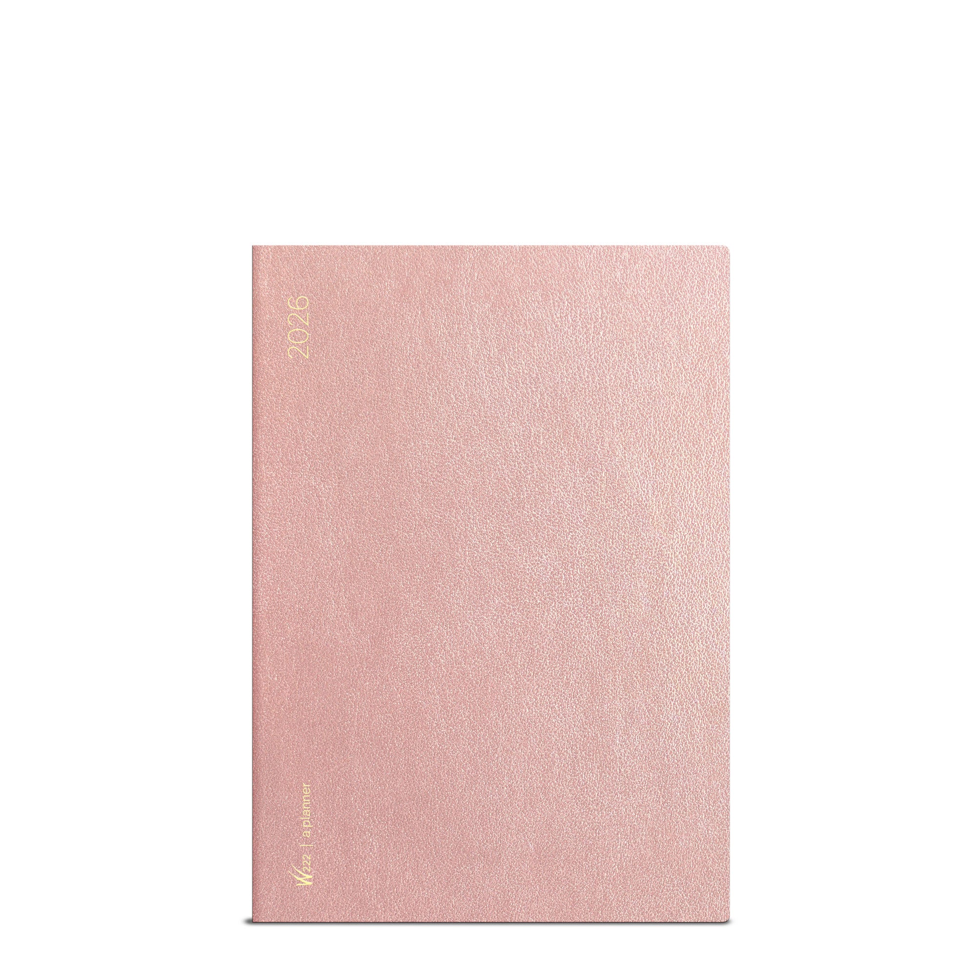 Wonderland 222 2026 B6 planner in Alpen Glow pink with gold foil year on textured minimalist cover.