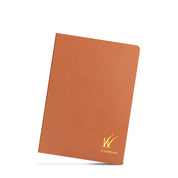 Wonderland 222 B6 notebook in honeysuckle with a gold brand detailing featuring 52gsm tomoe river paper.