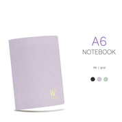 Wonderland 222's A6 notebook in Aster with 96-pages of tomoe river paper with a grid layout. Two additional colors shown below.