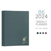 Wonderland 222 All-in-one weekly stacked planner in evergreen with additional colors shown below.