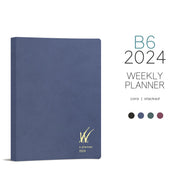 Wonderland 222 B6 weekly planner in Alpine Lake with ultra-thin fountain pen friendly paper with additional colors shown below.