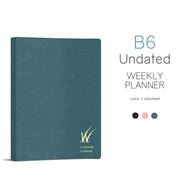 B6 Wonderland 222 weekly planner with a stacked weekends layout on tomoe river paper with two additional colors shown below.