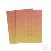 Wonderland 222 yellow to orange gradient index stickers featuring elegant monthly planner tabs and gold foil style typography